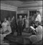 Photograph: [Students standing at front of class]