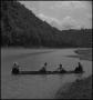 Photograph: [Four men in canoe]