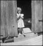 Thumbnail image of item number 1 in: '[Little Girl in Doorway Dreaming]'.