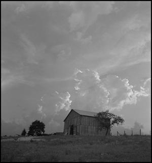 Primary view of object titled '[Clouds over a barn]'.