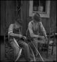 Thumbnail image of item number 1 in: '[Father and Son Caning a Chair]'.