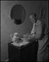 Photograph: [Harve Smith washing up in the morning]