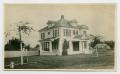 Photograph: [A two-story house]