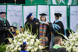 Primary view of object titled '[Mayborn student at UNT Commencement]'.