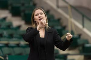 Primary view of object titled '[Sign language interpreter at UNT Commencement]'.