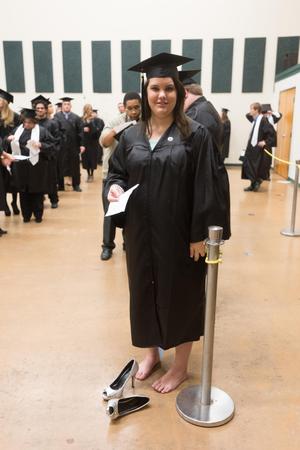 Primary view of object titled '[Student waiting before UNT Fall Commencement]'.