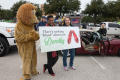 Thumbnail image of item number 1 in: '[Dorothy Bland with sign at homecoming parade]'.