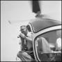 Photograph: [Joe Clark riding in a helicopter]