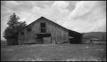 Photograph: [A large wooden barn]
