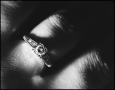 Photograph: [Photograph of a ring on a finger, 1]