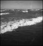 Photograph: [Photograph of waves crashing onto the beach, 1]