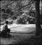 Photograph: [Boy fishing at a pond]