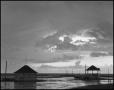 Photograph: [Photograph of the sky overlooking a beach]