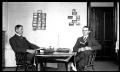 Photograph: [Byrd Jr. and Johnson Williams in dorm room]