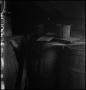 Photograph: [Two barrels in a shed, 2]