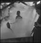 Photograph: [Dollie Ellison stirring in the steam(1)]