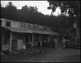Photograph: [Outside of a general store]