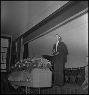 Primary view of object titled '[Mountain Funeral: Reverend's Sermon]'.