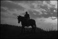 Photograph: [Silhouette of a man riding a horse, 11]