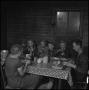 Photograph: [A family eating together at a table]