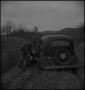 Photograph: [An automobile stuck in the mud]