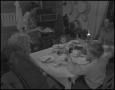 Photograph: [A family of five dining together]