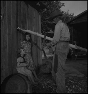 Primary view of [A man using a drawknife, 3]