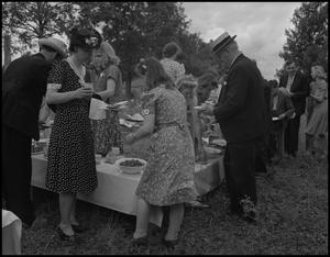 Primary view of object titled '[Wedding Guests in line for Food]'.