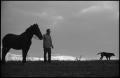 Photograph: [A man and a horse on a hill, 18]