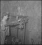 Photograph: [Photograph of miners with a drill]