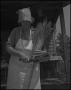 Primary view of [Aunt Nora Treece making a broom]