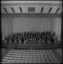Photograph: [An orchestra posing on stage, 4]
