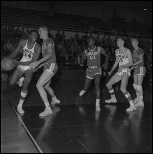 Primary view of object titled '[Basketball game between North Texas and Drake University]'.