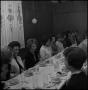 Photograph: [Women sitting at a banquet]
