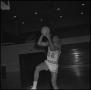 Photograph: [Matthew Huff going to toss up basketball]