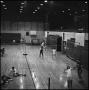 Photograph: [Men playing badminton in a gym, 5]