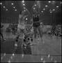 Photograph: [Blurry photo of a basketball game, 3]