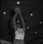Photograph: [North Texas Basketball Player No. 14 John Savage]