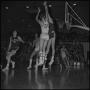 Photograph: [Basketball player shoots the ball, 3]