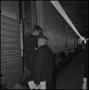 Photograph: [A student stepping off a train]