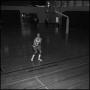 Photograph: [Jim Struck preparing to shoot a basketball]