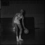 Photograph: [Roy Ford dribbling ball with left hand]