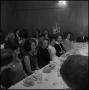 Photograph: [Men and women at a banquet]