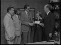Photograph: [Representatives of Atlantic Richfield present a check to NTSU]