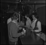 Photograph: [Students sharing drinks]