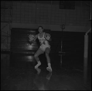 Primary view of object titled '[Willie Davis on the basketball court]'.