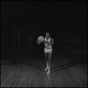 Primary view of object titled '[Bobby Iverson passing a basketball]'.