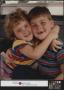 Photograph: [Brother and sister embrace]