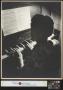 Photograph: [Miss Mary Bobo Playing Piano (2)]
