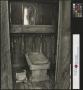 Photograph: [Inside of an Outhouse]